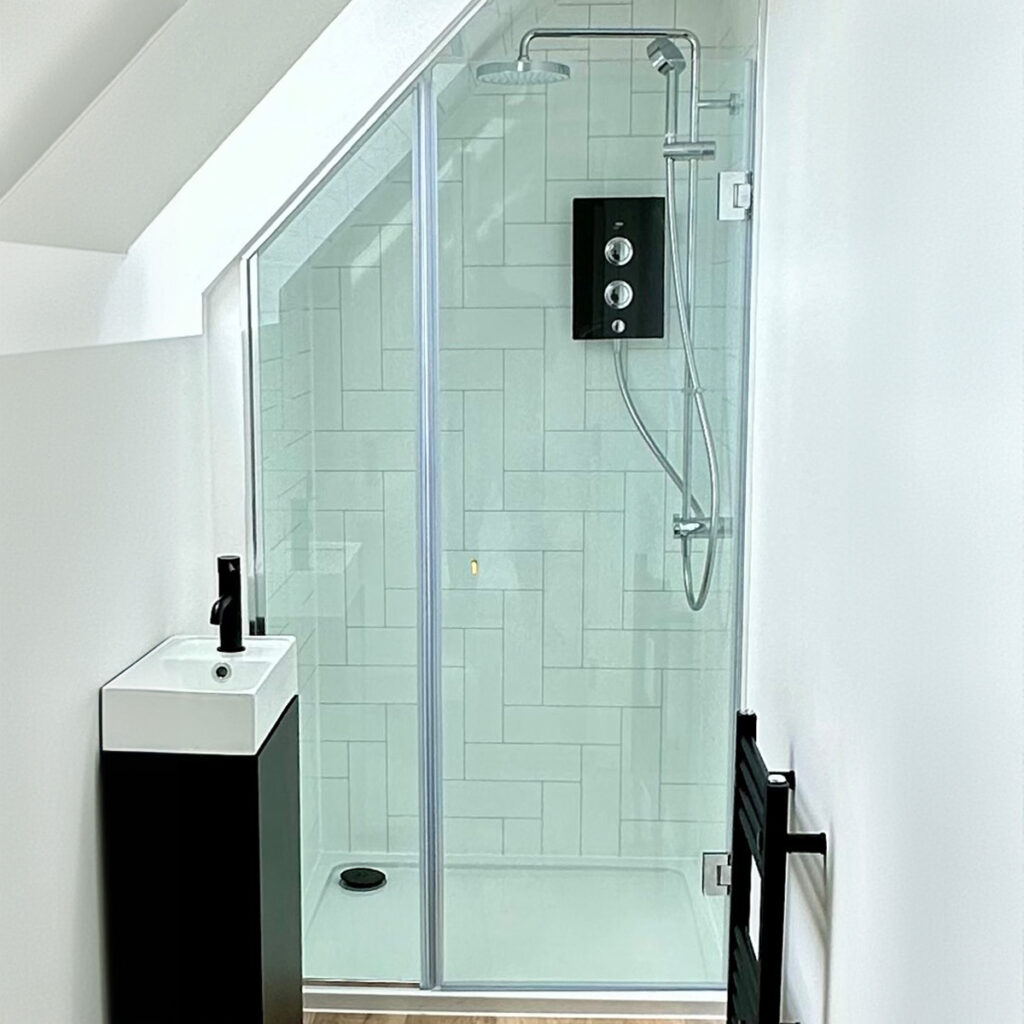 Bespoke glass shower screen with magnetic glass to glass seals